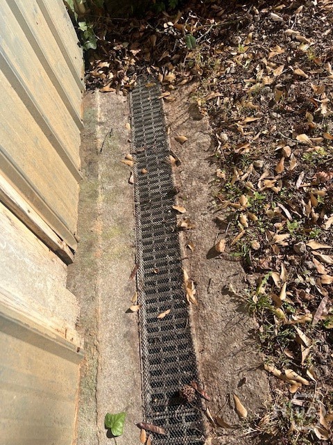 121 Hilltop Road Athens, GA 30605 - Photo 12 of 14 Drain at basement door entrance connected to sub pump