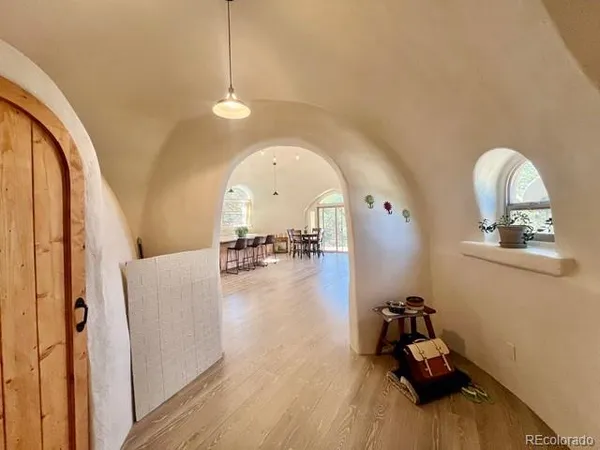 a view of a living room and hardwood floor