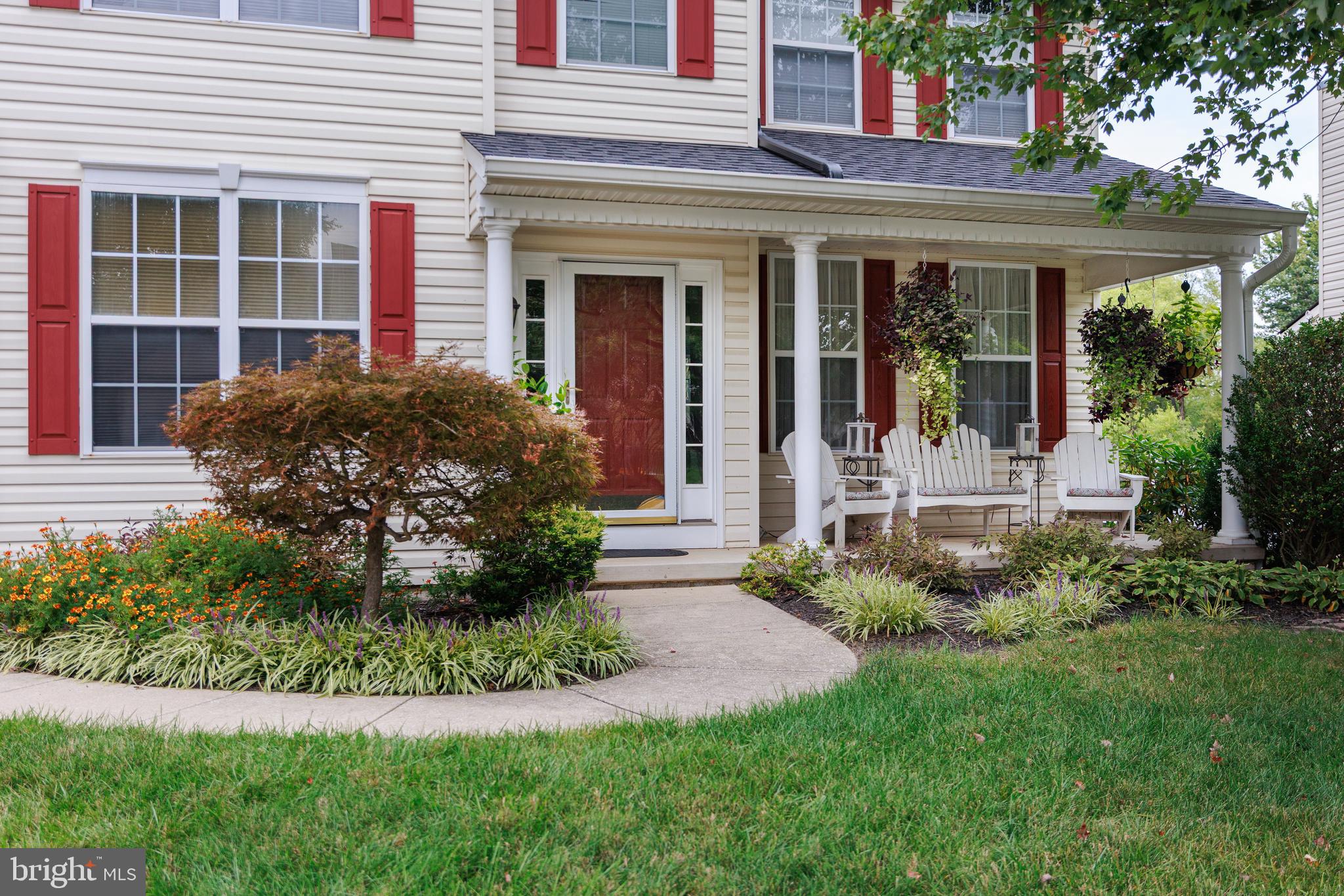 6265 White Birch Road Eldersburg, MD 21784 - Photo 2 of 17 front view of a house with a yard