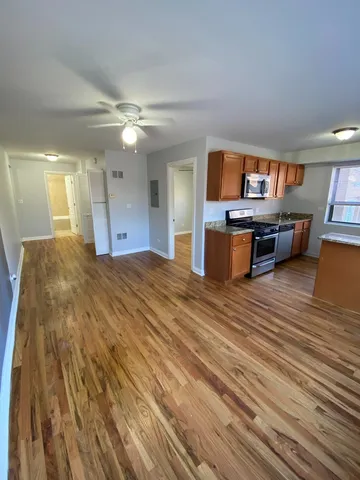 a bed room with a bed and furniture