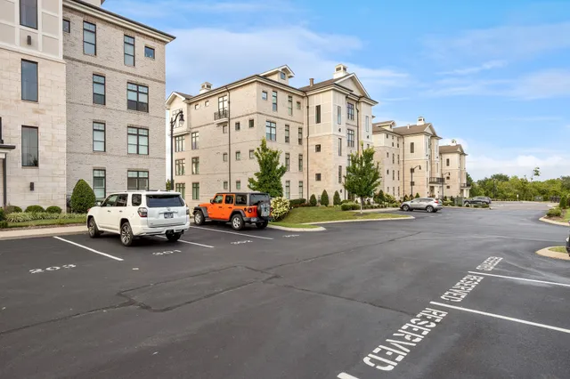 a view of a building with a garden