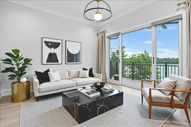 a open kitchen with stainless steel appliances granite countertop a stove a sink dishwasher a dining table and chairs with wooden floor