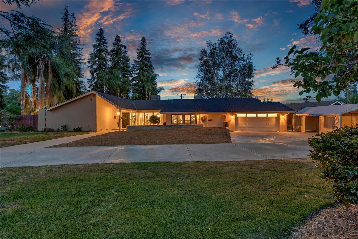 a view of swimming pool with an outdoor space and seating area