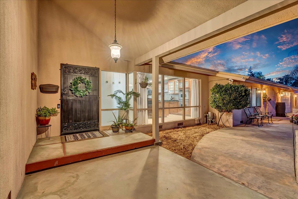 30960 Tower Road Visalia, CA 93292 - Photo 17 of 76 a spacious bedroom with a large bed and a large window