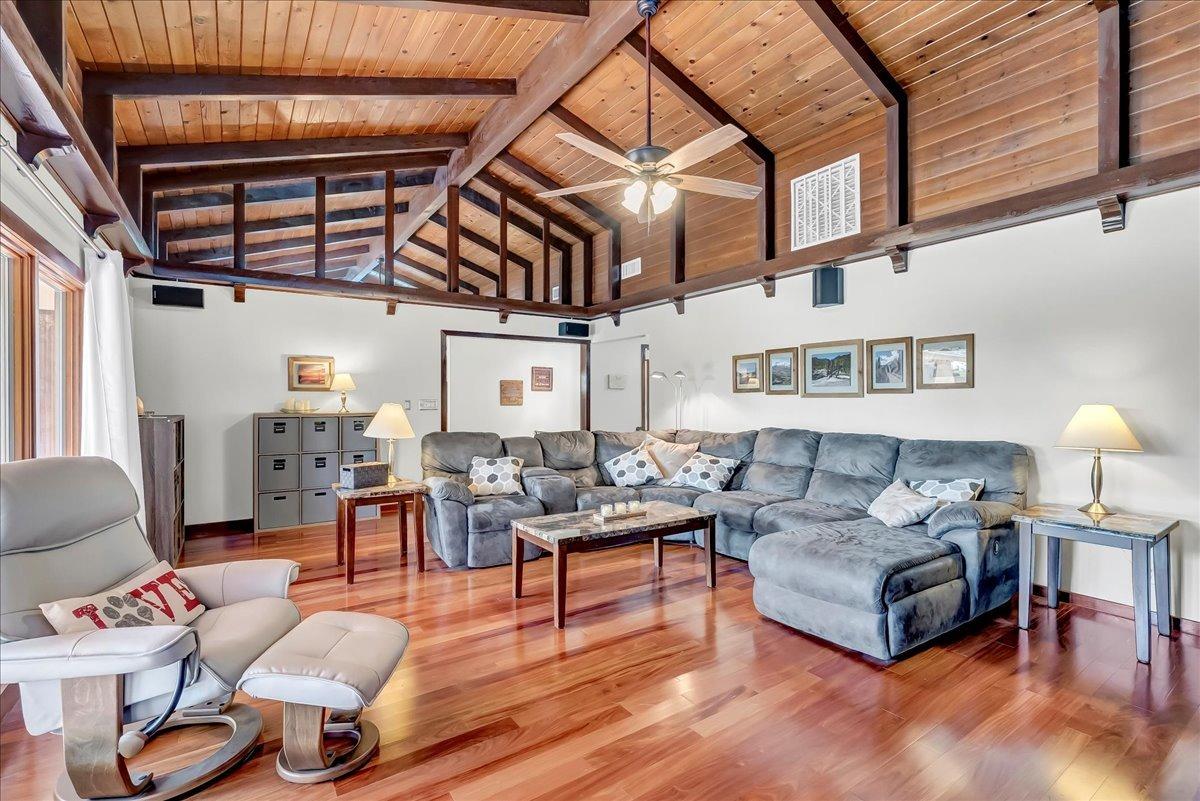 30960 Tower Road Visalia, CA 93292 - Photo 18 of 76 a living room with furniture and wooden floor
