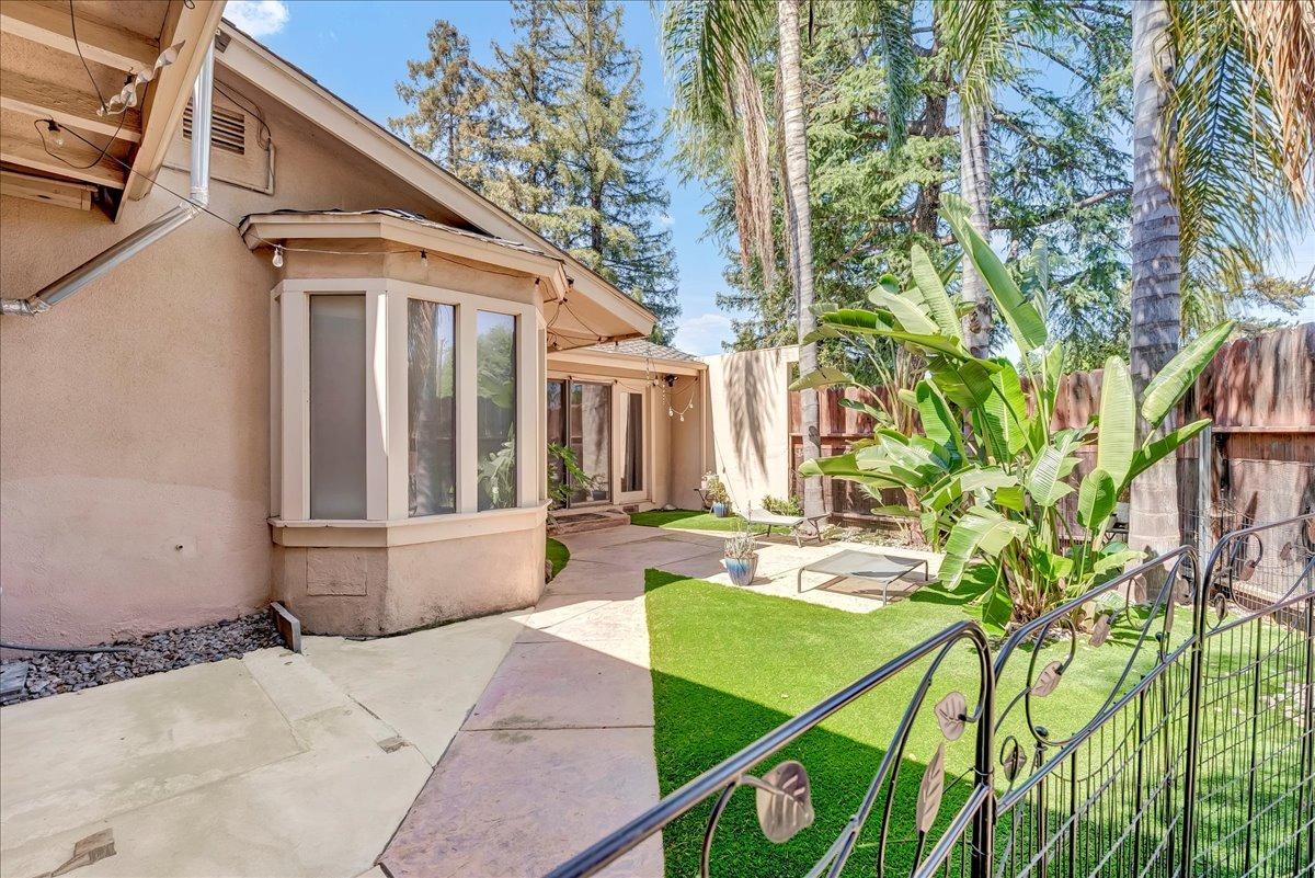 30960 Tower Road Visalia, CA 93292 - Photo 20 of 76 a view of a house with backyard and sitting area
