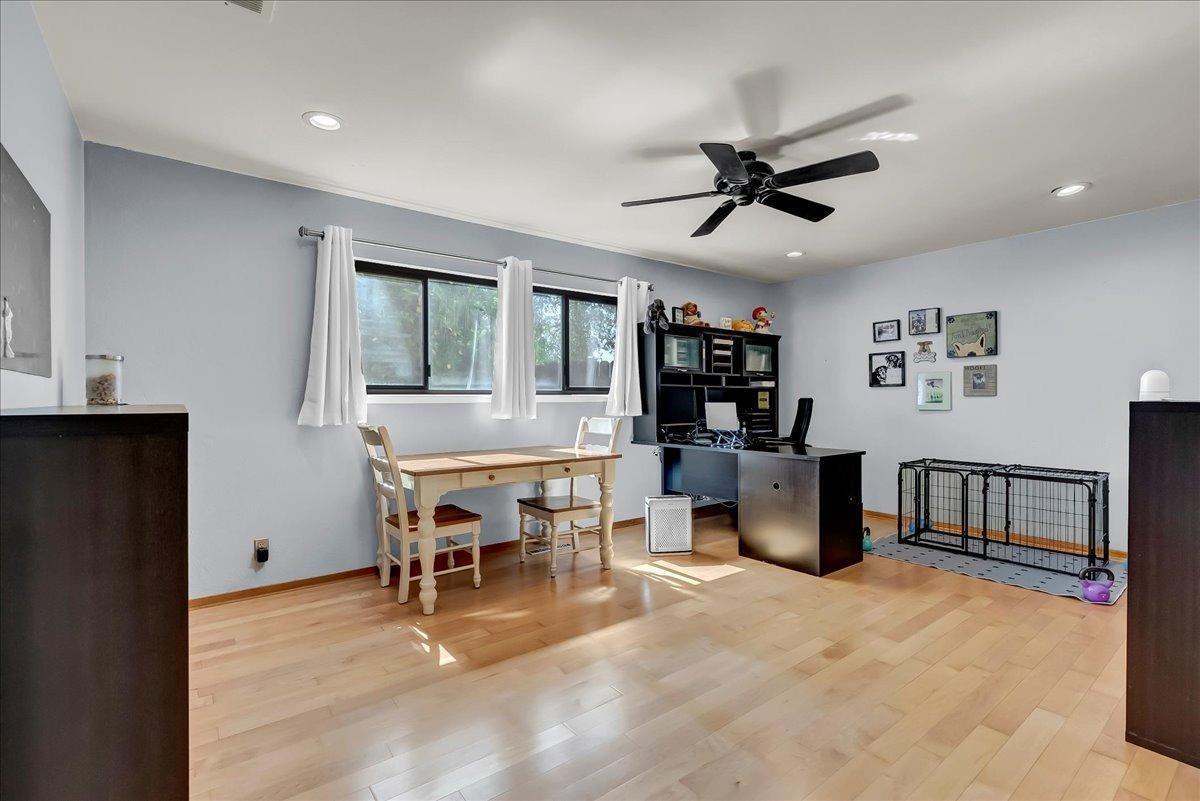 30960 Tower Road Visalia, CA 93292 - Photo 22 of 76 a workspace with furniture and window