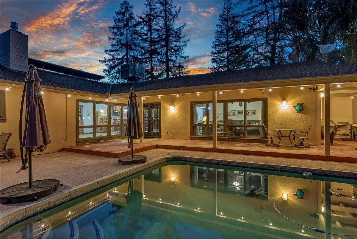 30960 Tower Road Visalia, CA 93292 - Photo 24 of 76 a view of a swimming pool with a patio