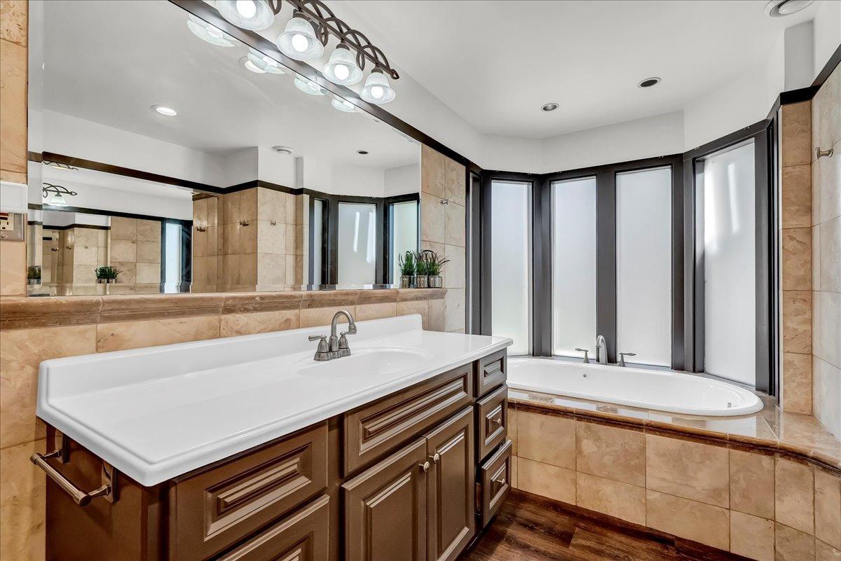 30960 Tower Road Visalia, CA 93292 - Photo 46 of 76 a bathroom with a sink and a mirror