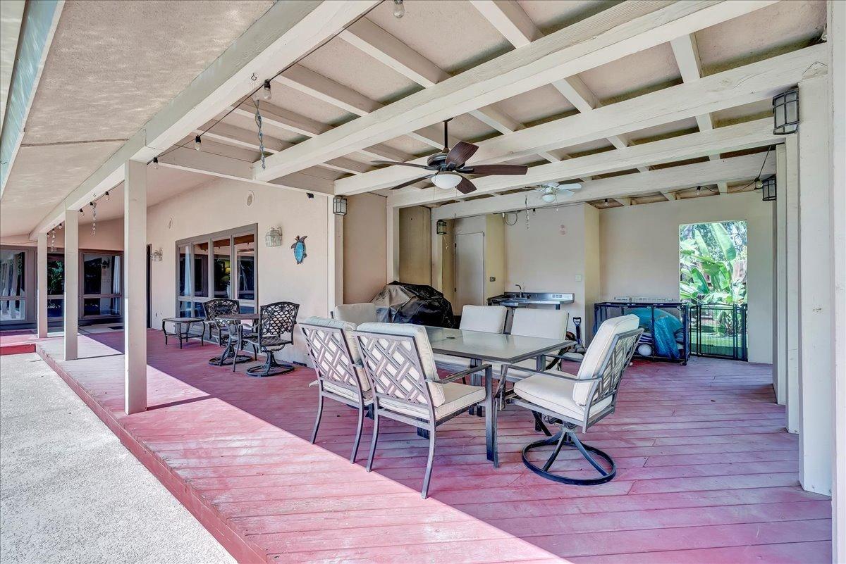 30960 Tower Road Visalia, CA 93292 - Photo 60 of 76 a living room with patio furniture and a wooden floor