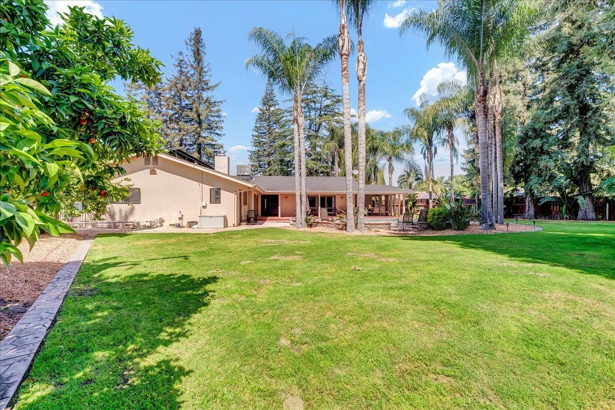 30960 Tower Road Visalia, CA 93292 - Photo 63 of 76 a view of house with yard and entertaining space