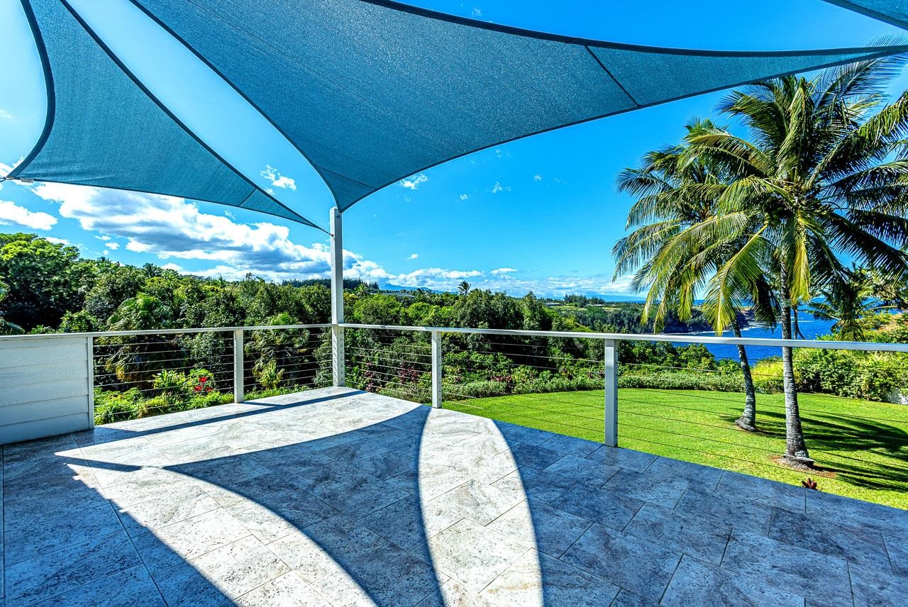 555 North Holokai Road Haiku, HI 96708 - Photo 24 of 50 Step out from the upstairs primary bedroom onto your private deck to see panoramic views