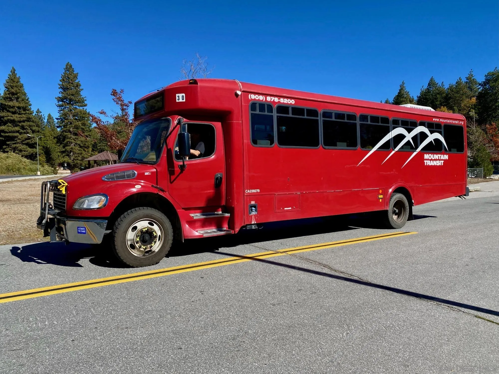 32065 Hunsaker Way, Unit 12 Running Springs, CA 92382 - Photo 13 of 39 a blue car parked in front of a house