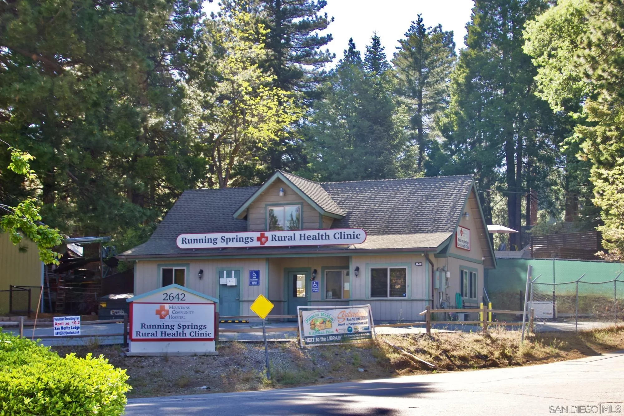 32065 Hunsaker Way, Unit 12 Running Springs, CA 92382 - Photo 15 of 39 a front view of a house with garden