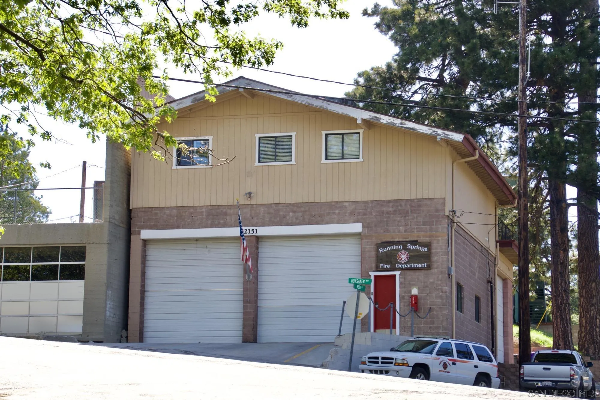 32065 Hunsaker Way, Unit 12 Running Springs, CA 92382 - Photo 17 of 39 a front view of a house with parking