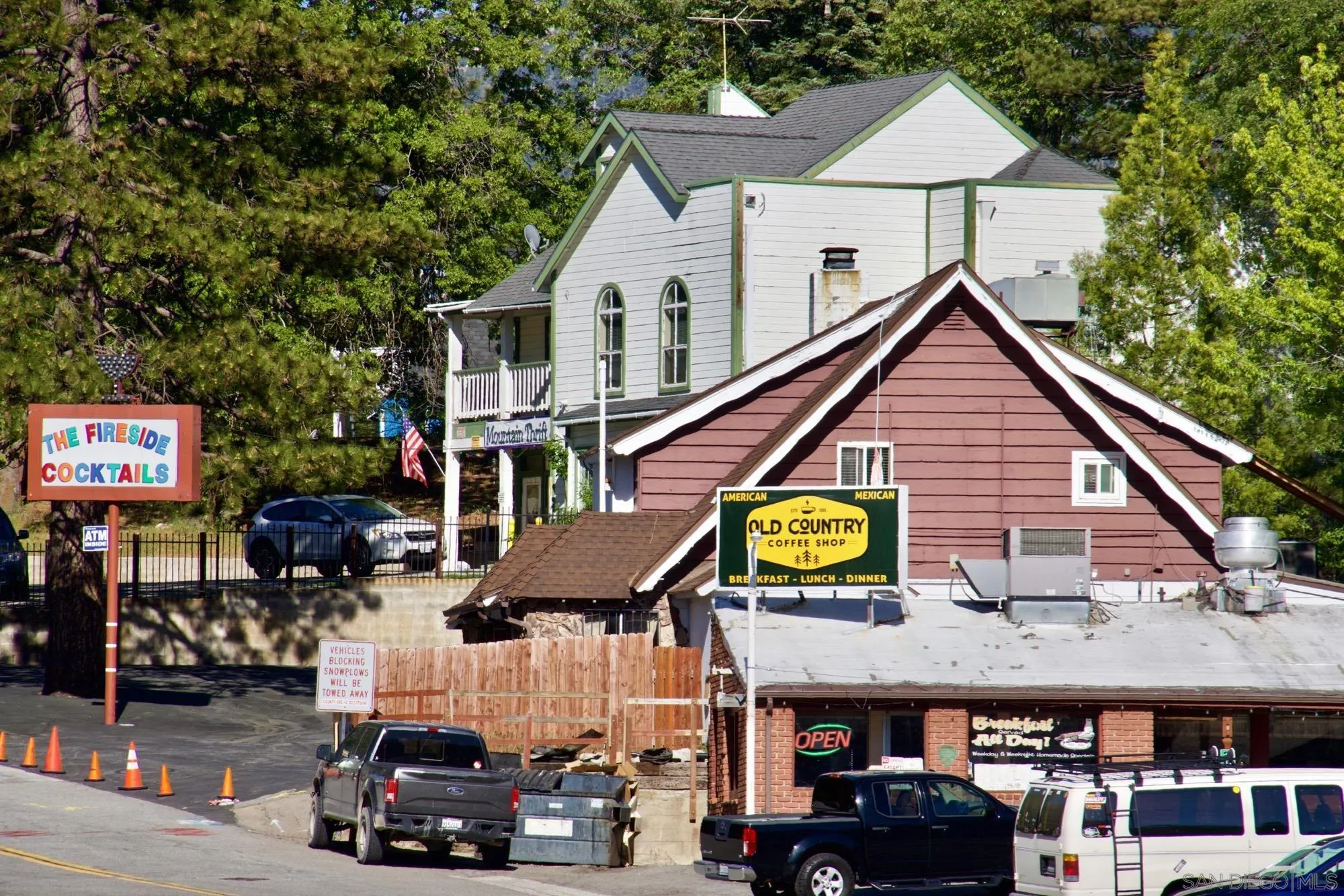 32065 Hunsaker Way, Unit 12 Running Springs, CA 92382 - Photo 23 of 39 a view of multiple houses with a street