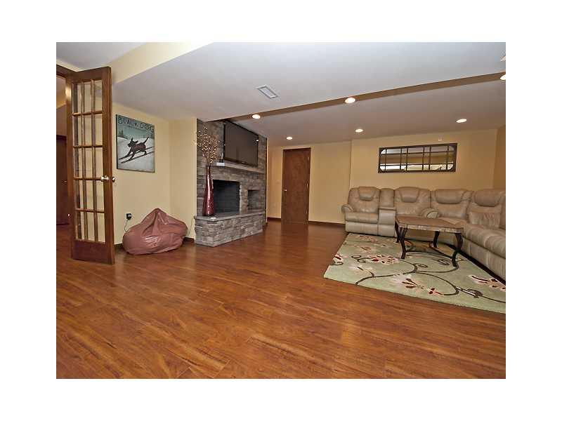 332 Country Club Road Washington, PA 15301 - Photo 16 of 24 Family Room. Huge family room in walk-out basement offers another stone fireplace and beautiful floors.