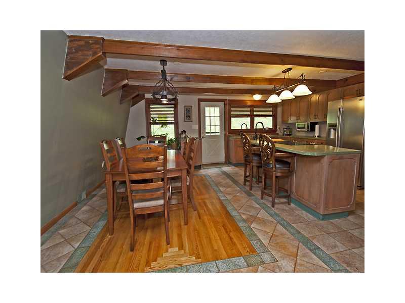 332 Country Club Road Washington, PA 15301 - Photo 3 of 24 Kitchen. Notice the wonderful ceramic floor with hardwood inlay in the kitchen/dining area. Kitchen has a double sink plus a separate vegetable sink and all three sinks are copper.