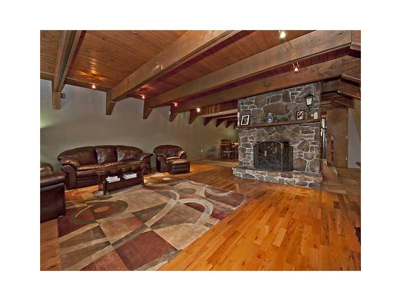 332 Country Club Road Washington, PA 15301 - Photo 9 of 24 Great Room. Beamed ceilings, stone fireplace and hardwood floors make this great room spectacular.