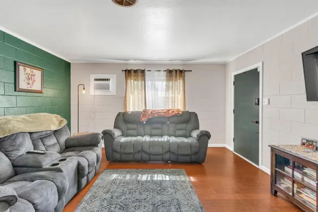 a living room with furniture and a couch