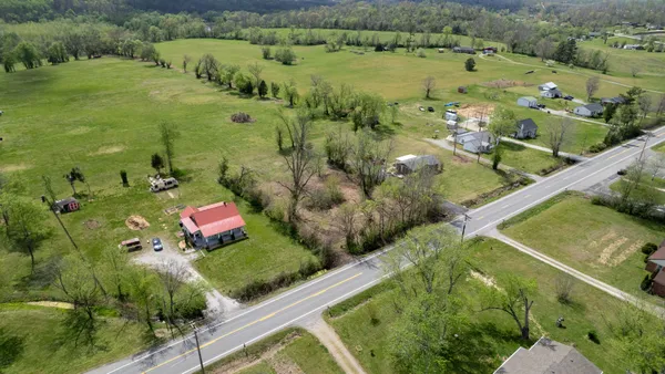 a view of a lake with a yard