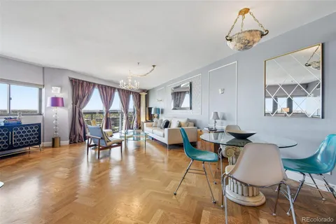a view of a living room and kitchen