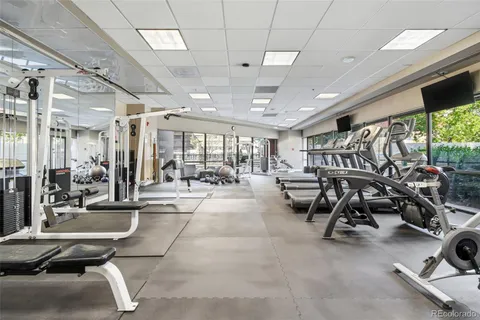 a view of a swimming pool with chairs