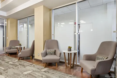 a view of a livingroom with furniture and window