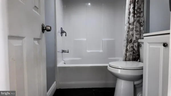 a bathroom with a sink and toilet