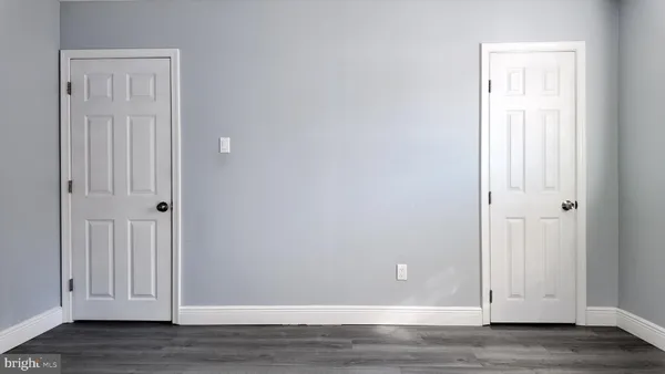 a view of a livingroom with wooden floor