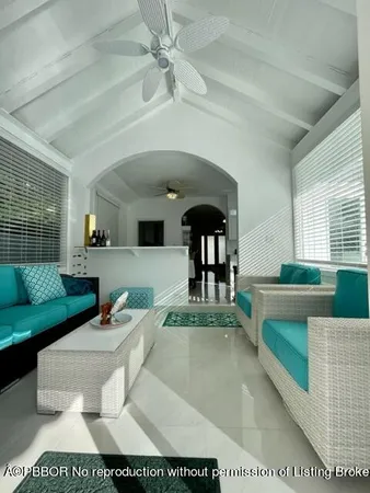 a view of living room kitchen with furniture and outdoor view