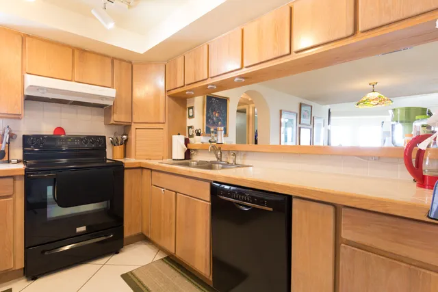 a living room filled with furniture and a rug