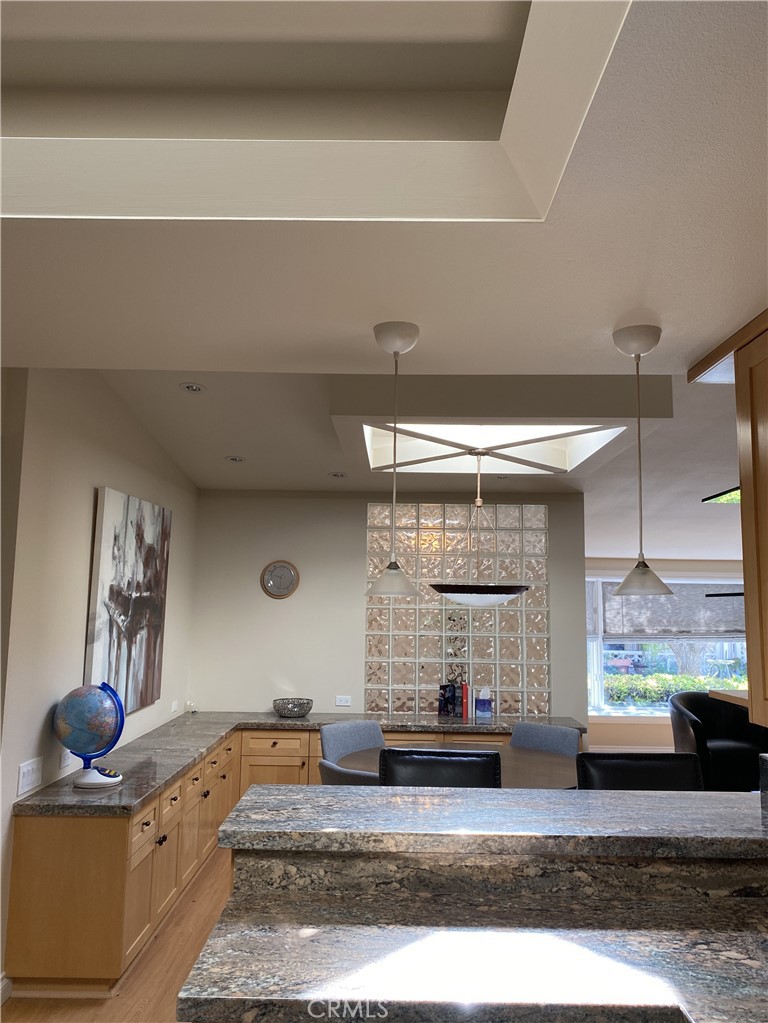 1771 Sunningdale Road Seal Beach, CA 90740 - Photo 17 of 30 a living room with stainless steel appliances granite countertop furniture and a counter top space