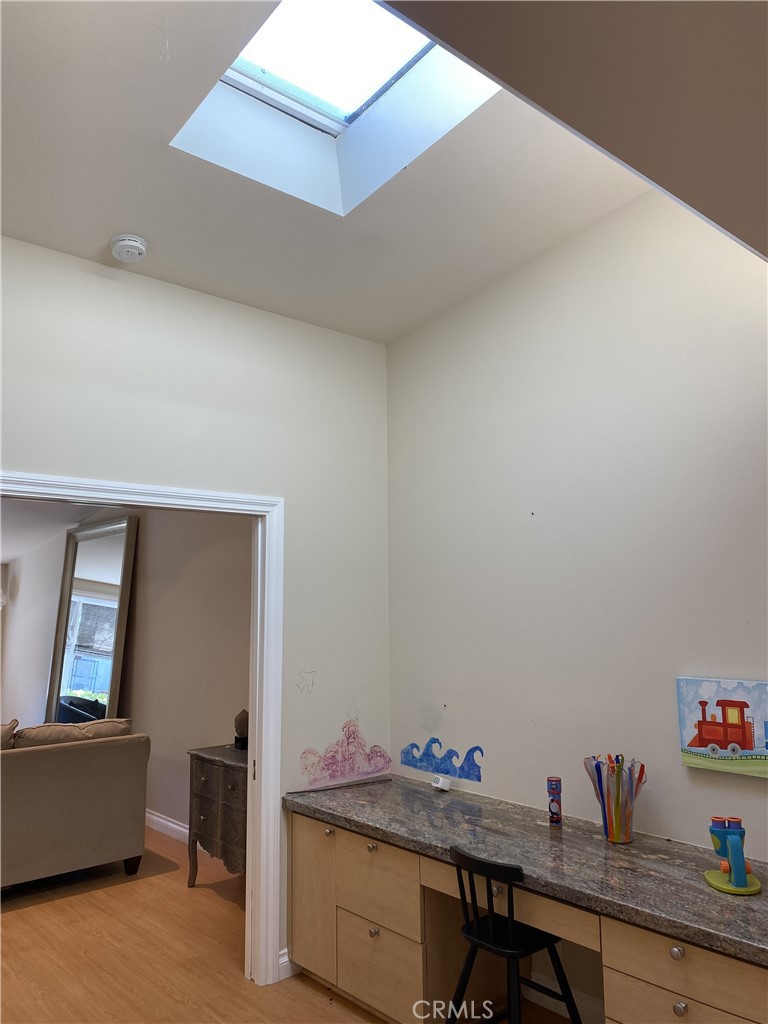 1771 Sunningdale Road Seal Beach, CA 90740 - Photo 27 of 30 a workspace with furniture and window