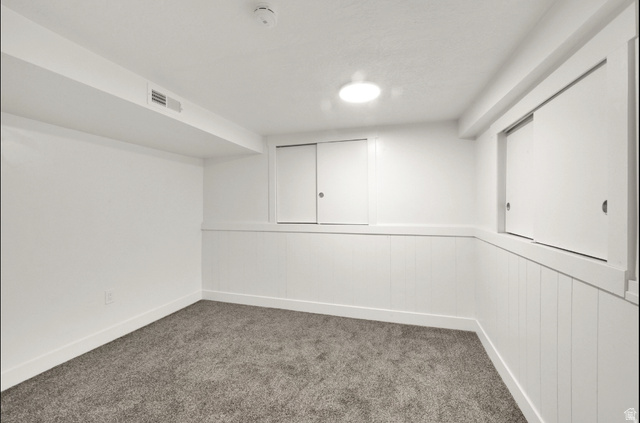 197 West Center Street Midvale, UT 84047 - Photo 12 of 12 Finished basement featuring dark carpet
