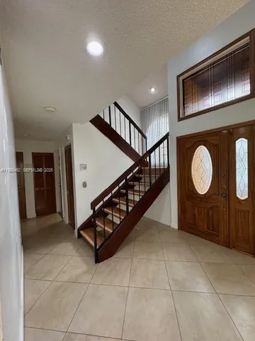 a view of a hallway with entryway