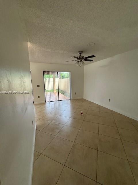 6311 Southwest 127th Court, Unit 6311 Miami, FL 33183 - Photo 5 of 13 a view of an empty room with a window