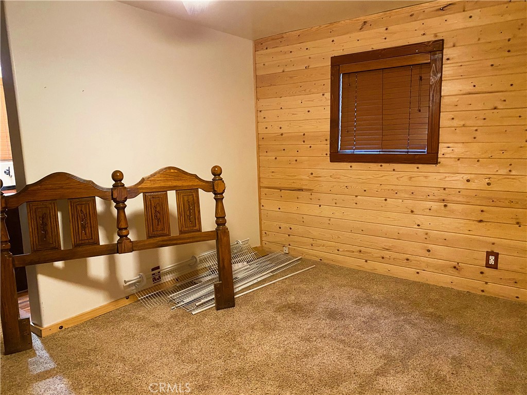 22166 Crestline Road Palomar Mountain, CA 92060 - Photo 22 of 58 a view of a brick house with a yard