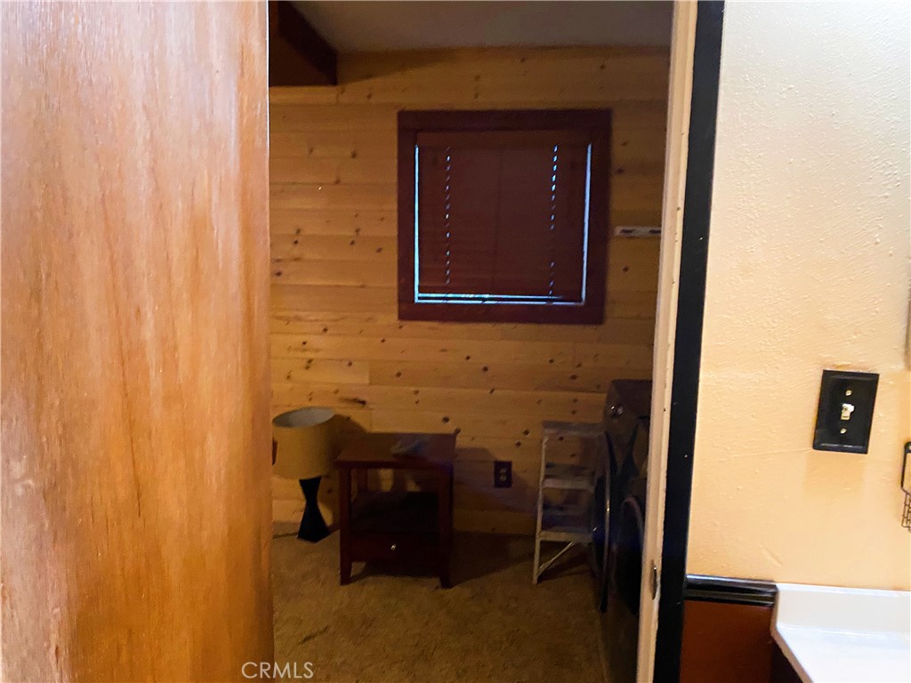 22166 Crestline Road Palomar Mountain, CA 92060 - Photo 28 of 58 a bathroom with a sink and a mirror