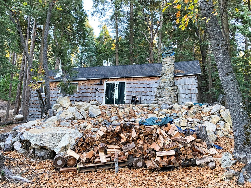 22166 Crestline Road Palomar Mountain, CA 92060 - Photo 37 of 58 front view of house with a trees