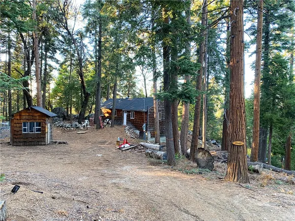 a view of a car park in front of house