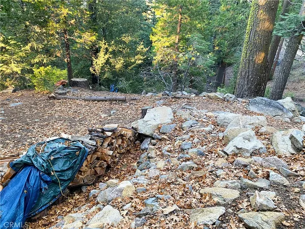 a view of wooden floor with a large window
