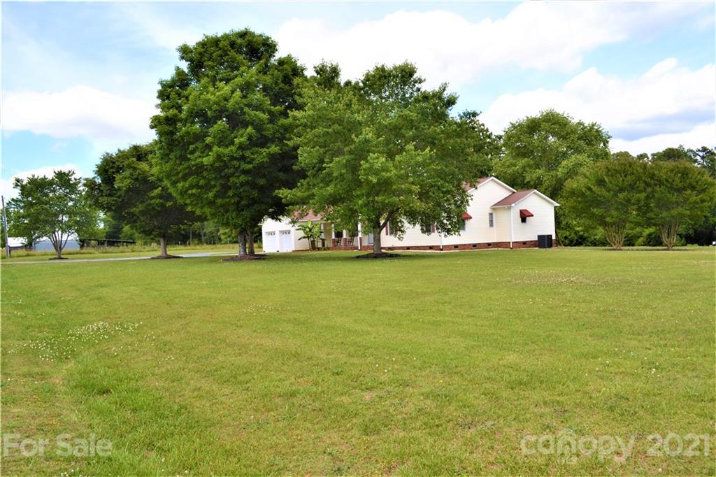 3442 Wike Road Catawba, NC 28609 - Photo 5 of 47 a view of a large trees with lawn chairs