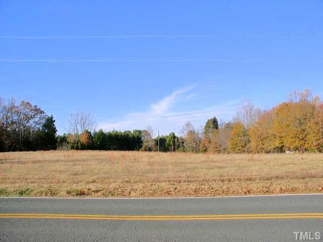 4425 Green Level W Road, Unit 1 Apex, NC 27523 - Photo 1 of 3 View looking south from Green Level West Road showing lower field to left of property.