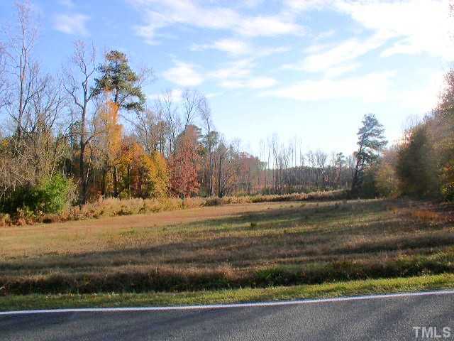 4425 Green Level W Road, Unit 1 Apex, NC 27523 - Photo 3 of 3 The open field between the first tree line and the second tree line is on this property.