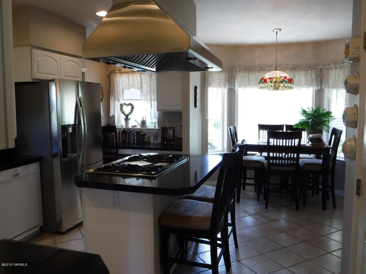 11301 Summitview Ext Road Yakima, WA 98908 - Photo 18 of 45 a dining room with furniture and window
