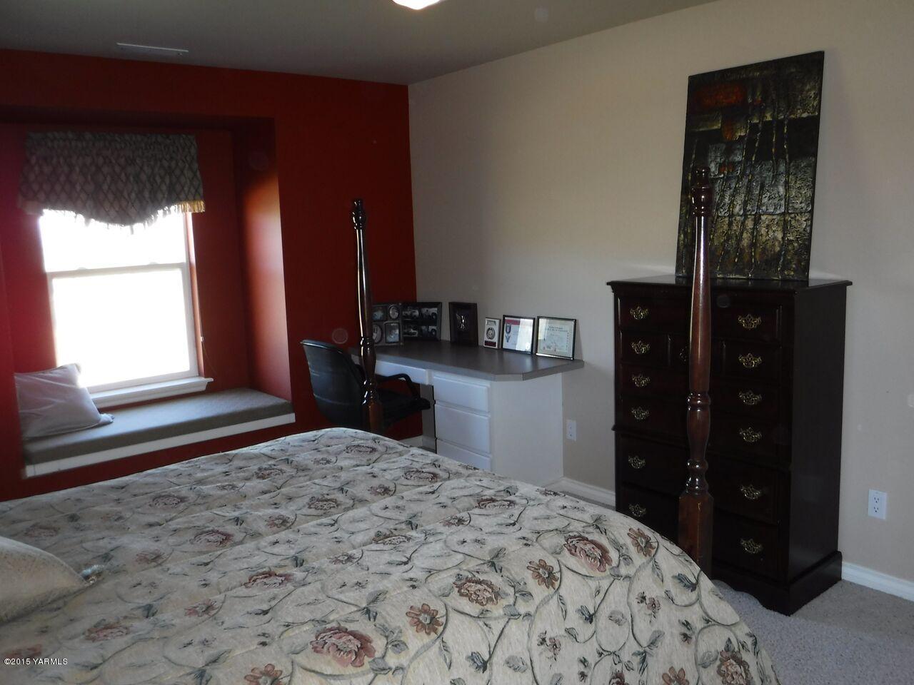 11301 Summitview Ext Road Yakima, WA 98908 - Photo 34 of 45 a bedroom with a bed and a closet