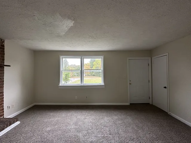 an empty room with a window