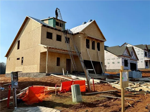 a backyard of a house with seating space