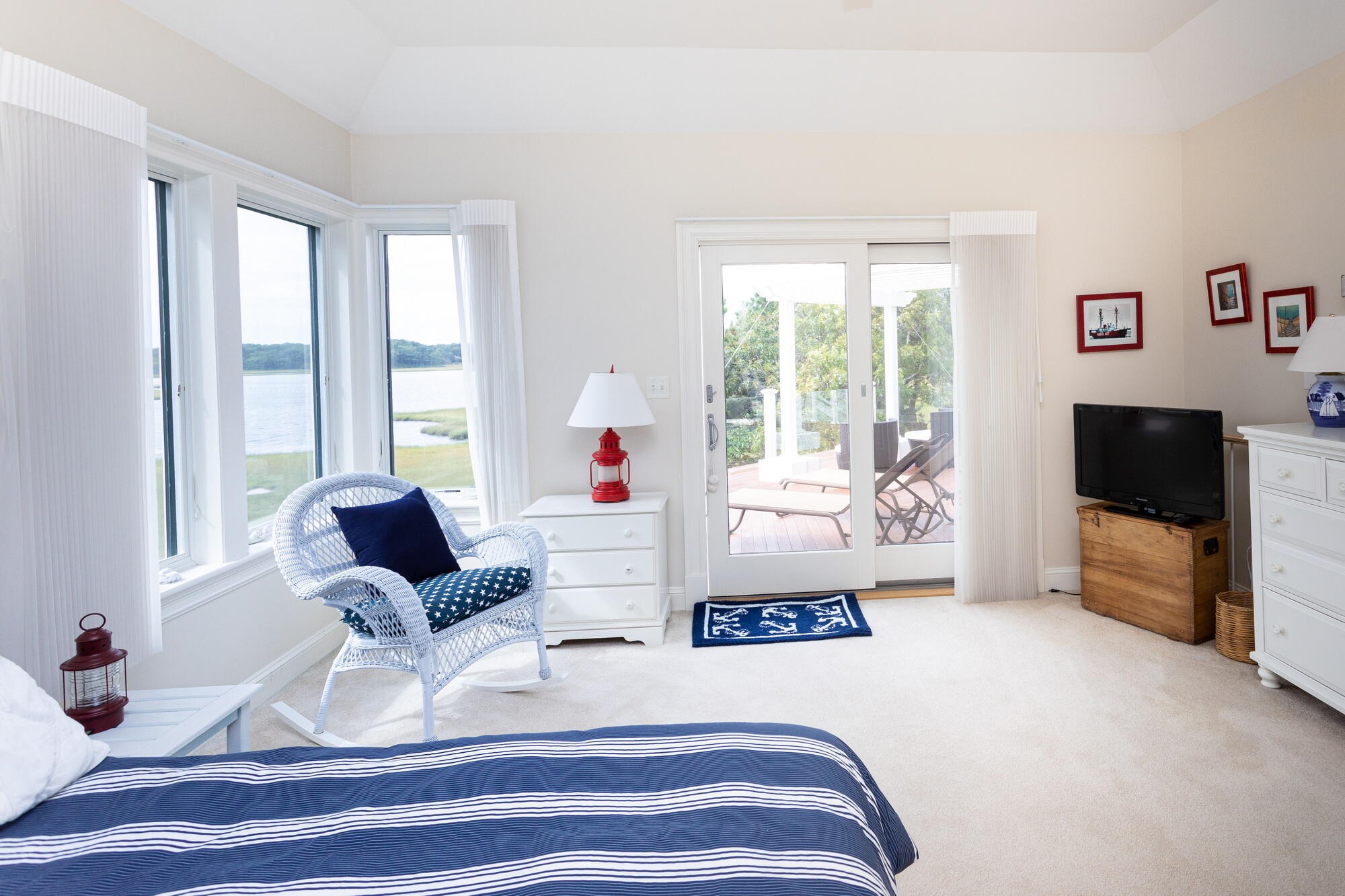 157 Monomoscoy Road Mashpee, MA 02649 - Photo 16 of 43 a living room with furniture and a flat screen tv